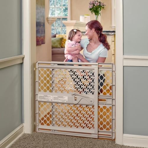 Toddleroo by North States Supergate Ergo Child Gate, Baby Gate for Stairs and Doorways. Includes Wall Cups. Pressure or Hardware Mount. Made in USA. (26" Tall, Sand)